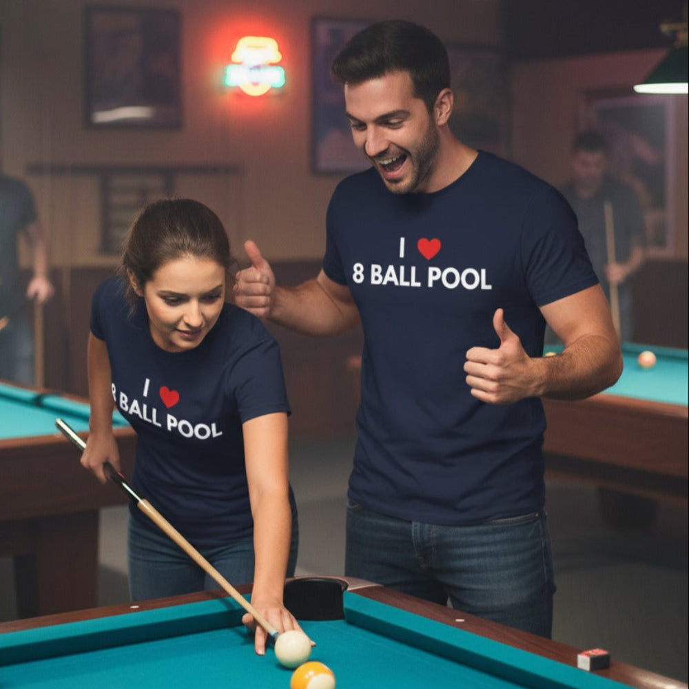 Two people playing pool in a bar setting, both wearing 'I ❤️ 8 Ball Pool' shirts.